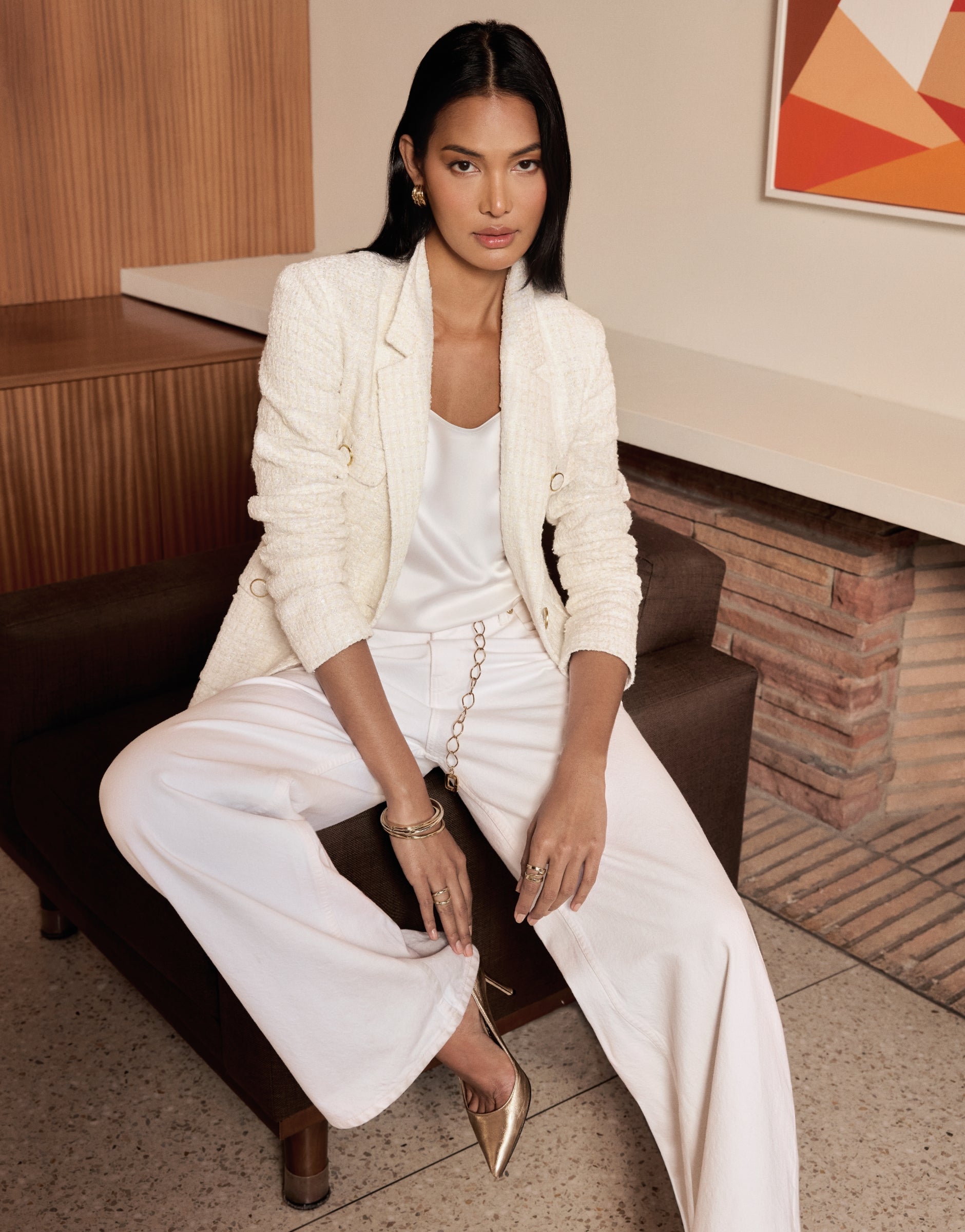 Woman wearing St John Knits Spring 2025 collection white jacket