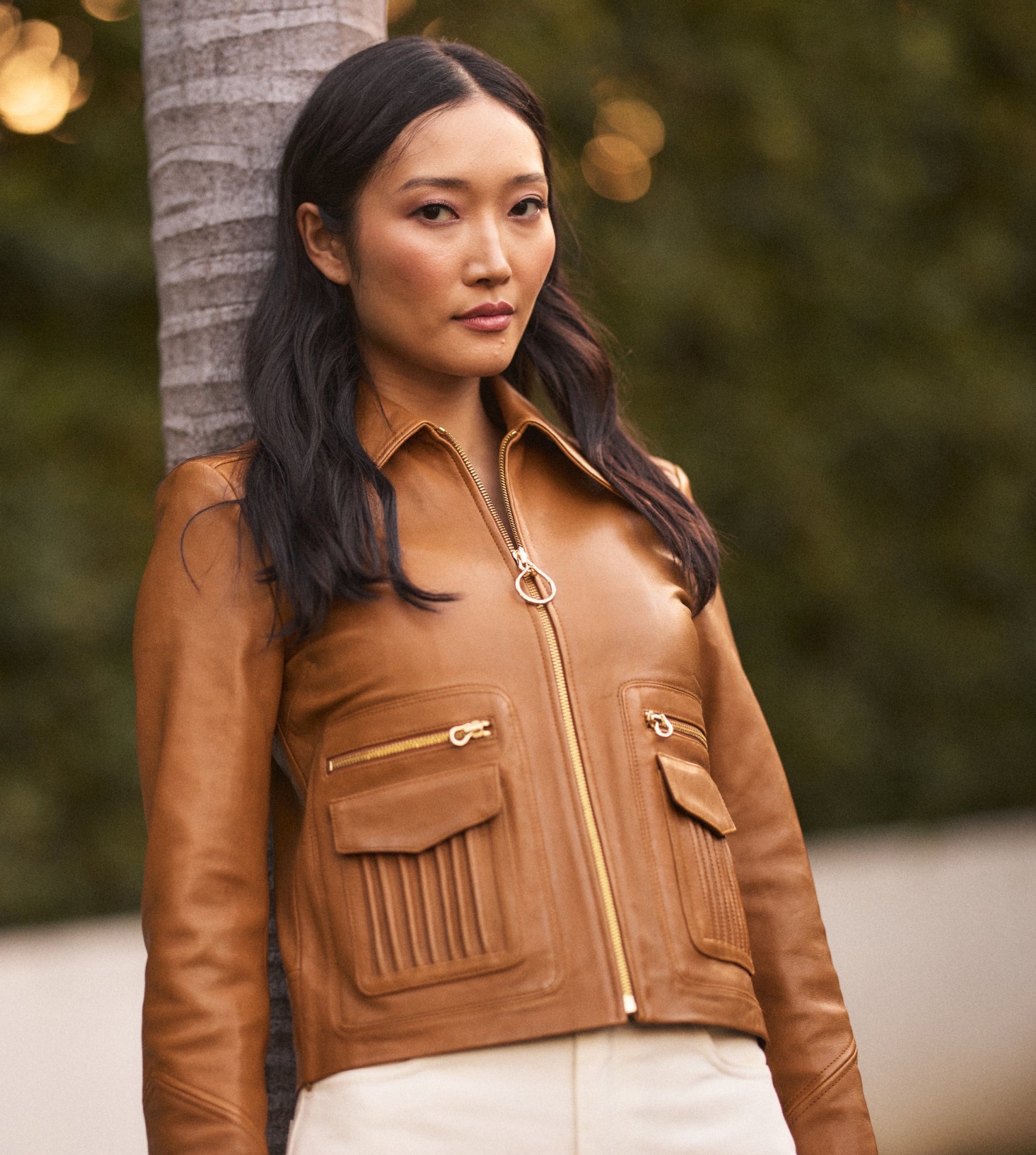 Woman wearing St John Knits Pre-Fall 2025 Collection Nappa leather jacket.
